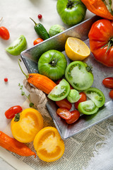 Set of different fresh raw colorful vegetables in metallic tray