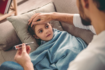 Little girl having a cold