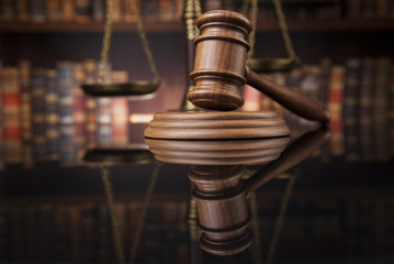 Law books, mallet of the judge, Courtroom background