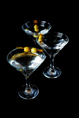 Margarita cocktail alcohol drink in glass with green olives