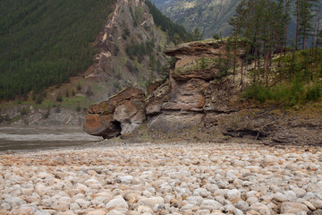 The rocky and dry riverbed in the mountains. Indigirka River. Yakutia. Russia.