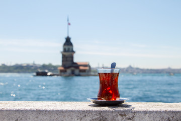 Turkish tea on the background of the Maiden Tower