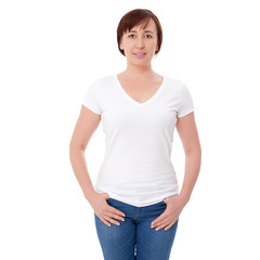 Obraz premium Shirt design and people concept - close up of woman in blank white t-shirt front isolated. Clean empty mock up template for design.