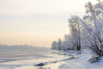 Trees covered by frost, ice and snow close to the Dnieper River in Kiev, Ukraine, during winter