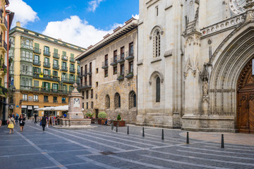 Fototapeta na wymiar The St. James square, basque, Done Jakue plaza in the old town of Bilbao. it is a medieval neighbourhood in the Casco Viejo with the Cathedral of Bilbao