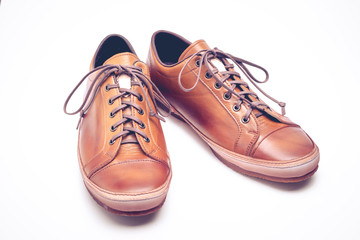 man leather brown shoes on white background.