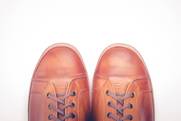 man leather brown shoes on white background.
