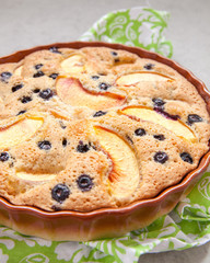 Biscuit pie with peaches and blueberries
