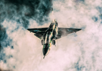 Military warplanes flying in the clouds