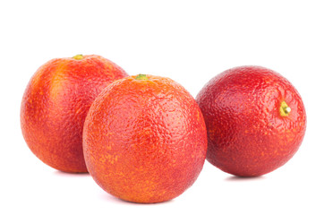 Three bloody red oranges