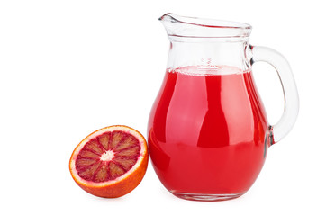 Glass jug with bloody orange juice