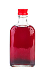 Glass bottle with pomegranate sirup