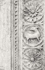 Fototapeta na wymiar (Umbria, Italy)- Stone carved decorations in Saint Francis of Assisi basilica, neo-gothic style. (antique effect, sepia).