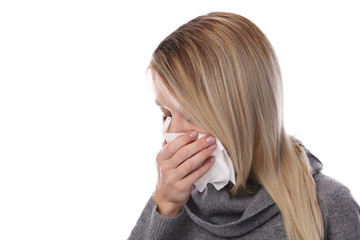 Woman caught cold , flu, running nose. Healthcare and medical concept isolated on white