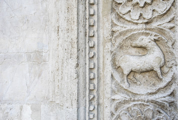 Fototapeta na wymiar (Assisi, Umbria, Italy)- Stone carved decorations in Saint Francis of Assisi basilica, neo-gothic style.