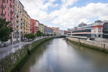 House facades along the Nervion River in Bilbao. The apartment buildings are in the San Frantzisko...