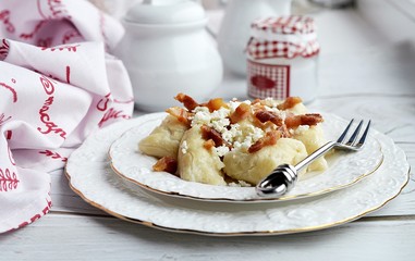 Lazy dumplings with bacon and cheese