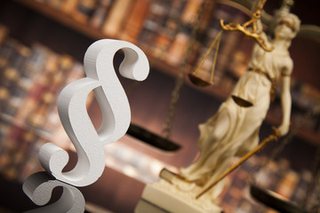 Paragraph, law and justice concept, wooden gavel, mirror backgro