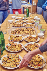  Christmas cookies on big family festive table