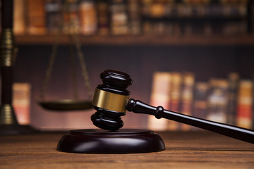 Law and justice concept, Brown wooden background