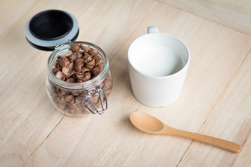 chocolate cereal cornflakes and milk for breafast