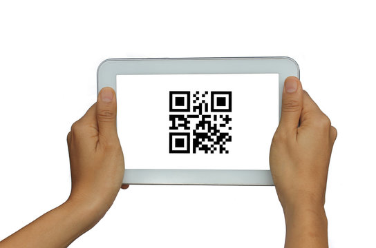 Holding tablet with QR code on screen, isolated