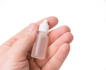 gloved hand keeps the sample tube