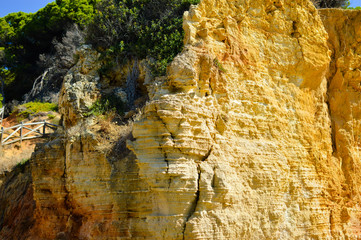 Beautiful summer landscape with rocky sandy green hills over bright sunshining blue sky outdoors . Holiday vacation destination for escaping buzy life background