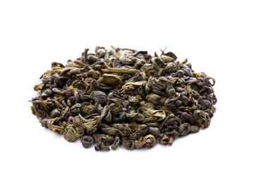 Leaves of green chinese gunpowder tea isolated on white backgrou