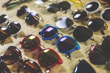 Fashion Sunglasses in shop. Unusual and original Collection of sunglasses. Instagram Filter.