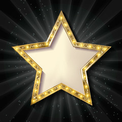 Gold star on a dark background.