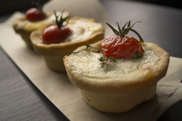 tartlet with mozzarella and cherry tomatoes