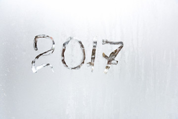 the inscription on the glass figure