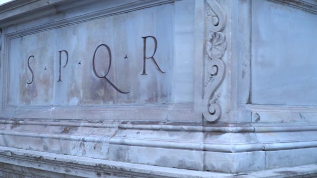 Roman symbol sign SPQR, Italian architecture detail on white marble