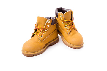 Yellow boots isolated on white background