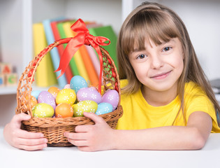 Fototapeta na wymiar Easter holiday - kid coloring eggs