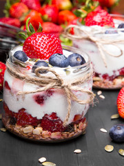 delicious dessert - yogurt with strawberries and blueberries