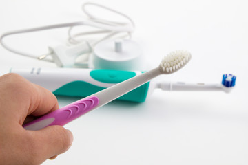 Soft focus toothbrush electric, Dental care tools on white background.