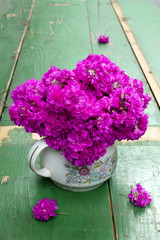 flower bouquet on wooden planks