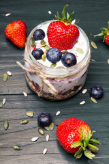 delicious dessert - yogurt with strawberries and blueberries