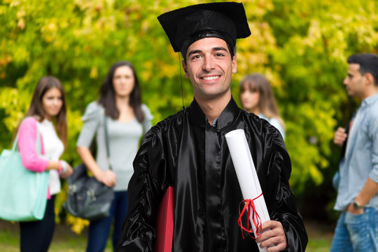Portrait of happy graduating student