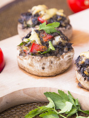 Stuffed champignons with eggs, cheese and paprika.