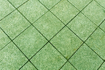 Green color pavement texture.
