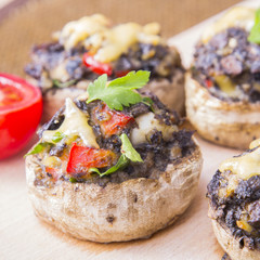 Stuffed champignons with eggs, cheese and paprika.