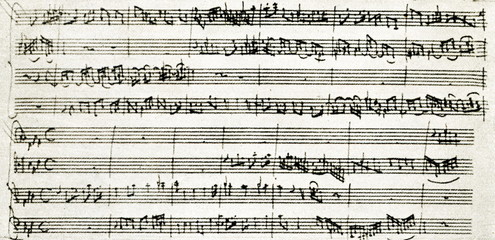 Naklejka premium Czteroczęściowy wynalazek z „Wohltemperierte Klavier” Bacha (II, 2) w „Zestawie na kwartet smyczkowy” Mozarta
