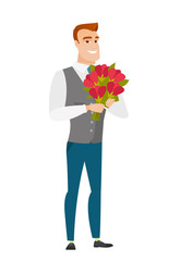 Caucasian businessman holding a bouquet of flowers