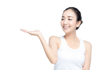 Asian young woman beautiful smile with posture present something in blank hand isolate on white background
