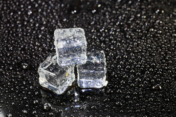 ice cubes on black background.
