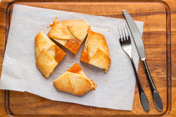 Small tart pie with persimmon and peach jam, french galette.