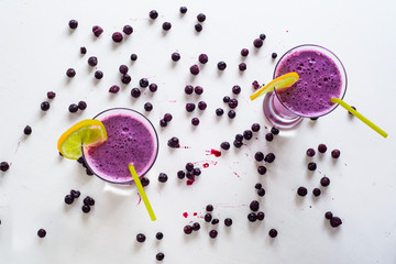 Blueberry smoothie on white background